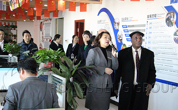 Mr. Amadou Boubacar CISSÉ Looking at the Flags Hung on the Roof of Rongsheng Office